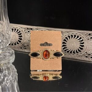 Gold and Black Brooch